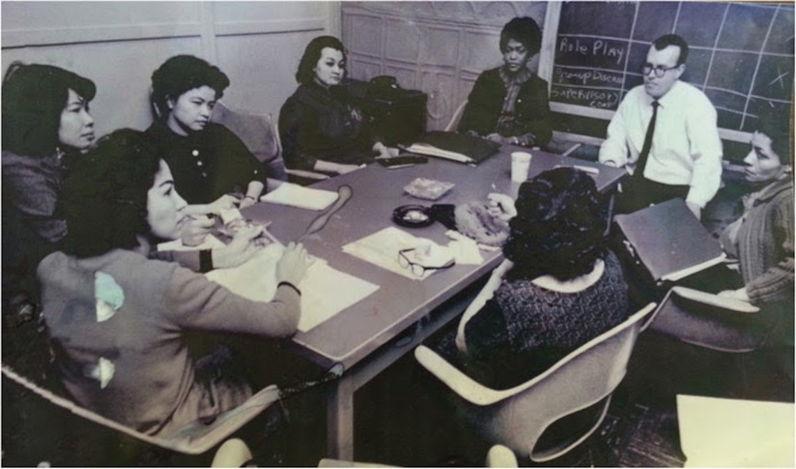 Mary Dowery and Frank Riessman (at the end of the table) lead a role-playing session for Lower East Side parents, 1963 or 1964